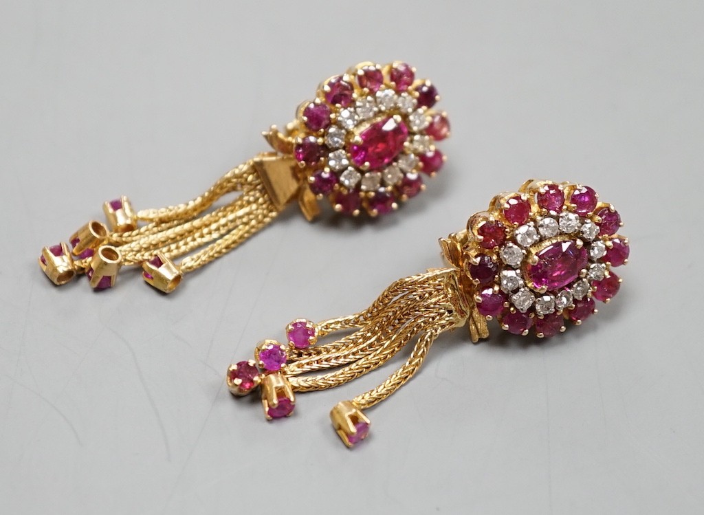 A pair of Middle Eastern yellow metal, ruby and diamond set oval cluster earrings, with detachable tassel drops, overall length 41mm, gross weight 15.5 grams.